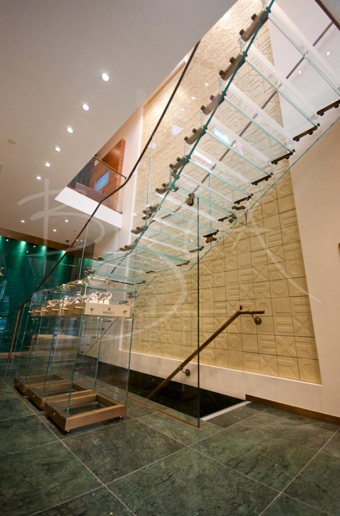 3322 - Bisca glass staircase design for Rolex Leeds