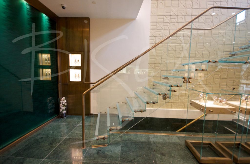 3322 - Bisca glass staircase design for Rolex Leeds