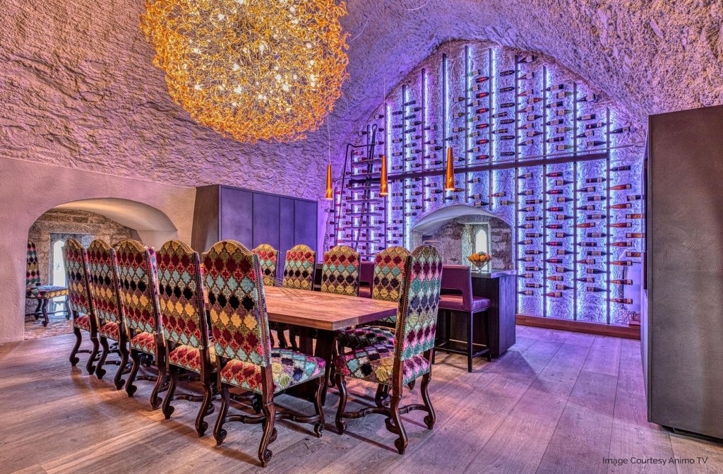 Illuminated-Bespoke-wine-wall-with-sliding-ladder-at-Belvelly-Castle