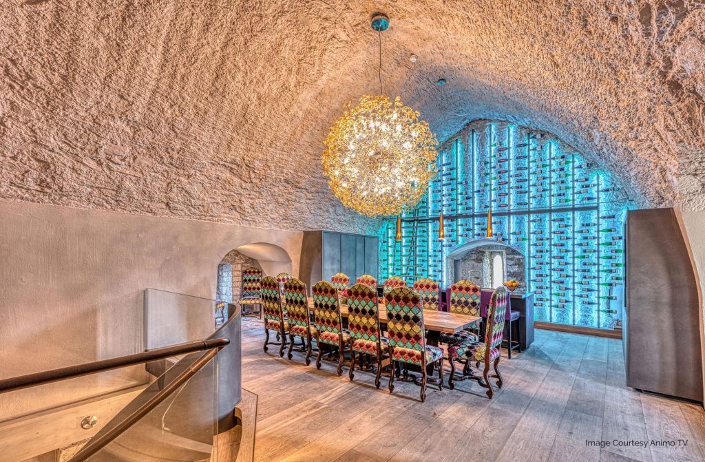 Illuminated-Bespoke-wine-wall-with-sliding-ladder-at-Belvelly-Castle