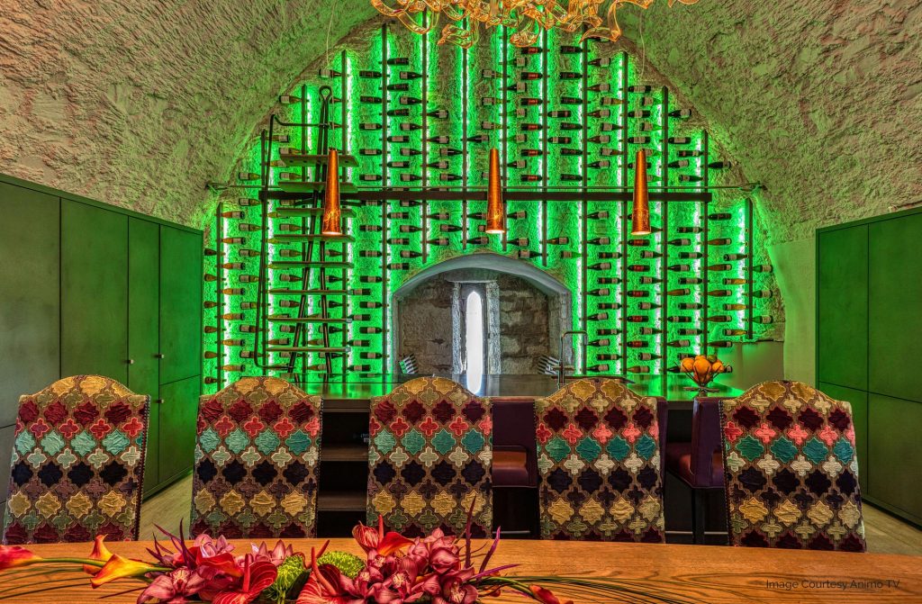 Illuminated-Bespoke-wine-wall-with-sliding-ladder-at-Belvelly-Castle