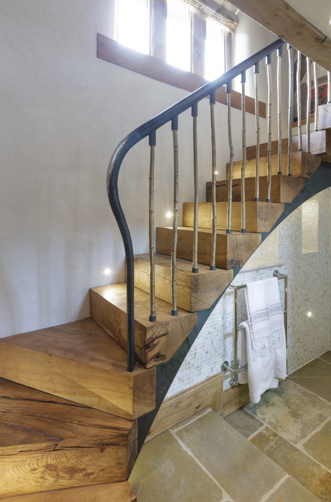 New stairs of a rustic design by Bisca in a mediaevel barn