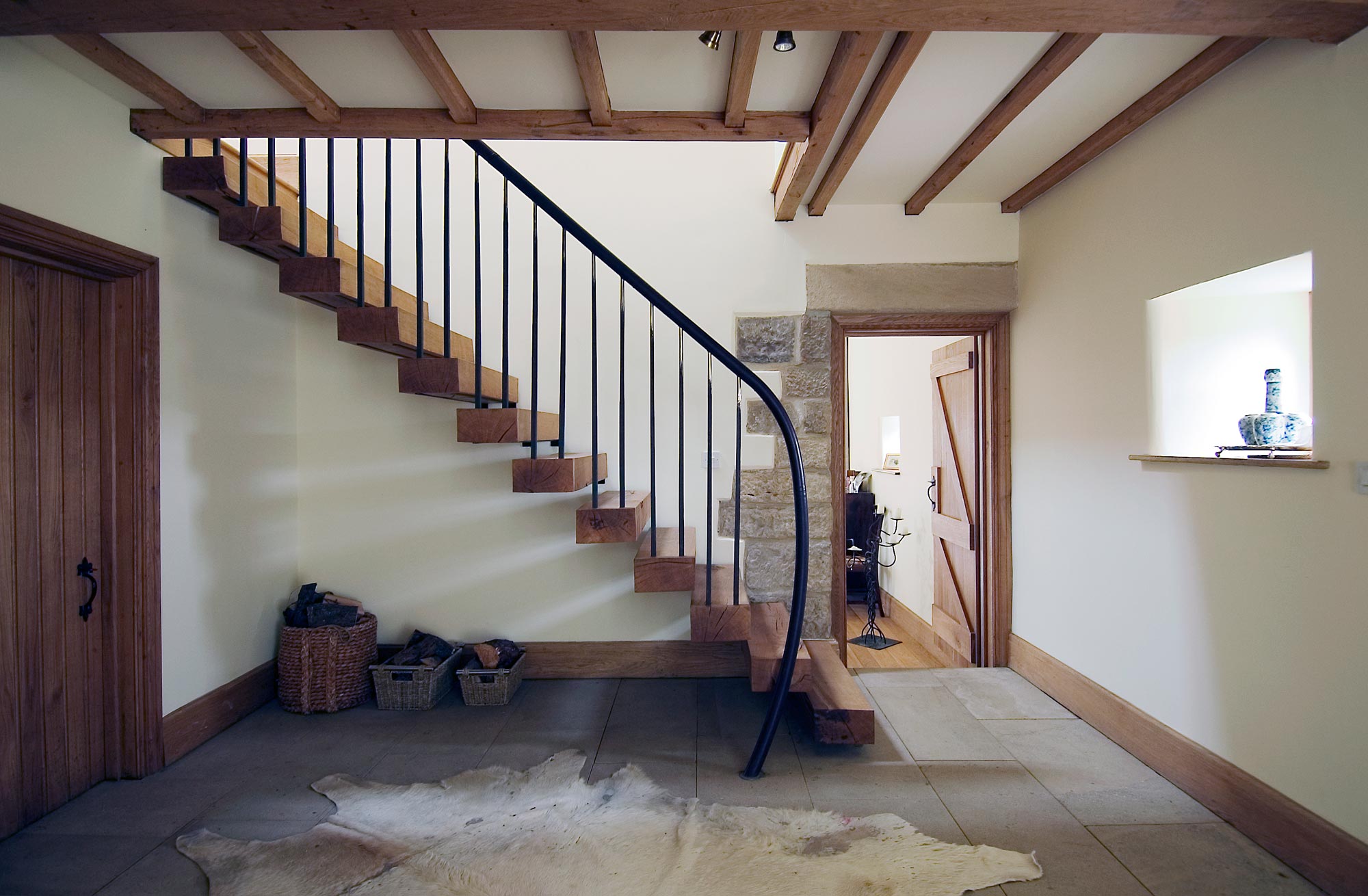 Modern cantilever in a barn conversion