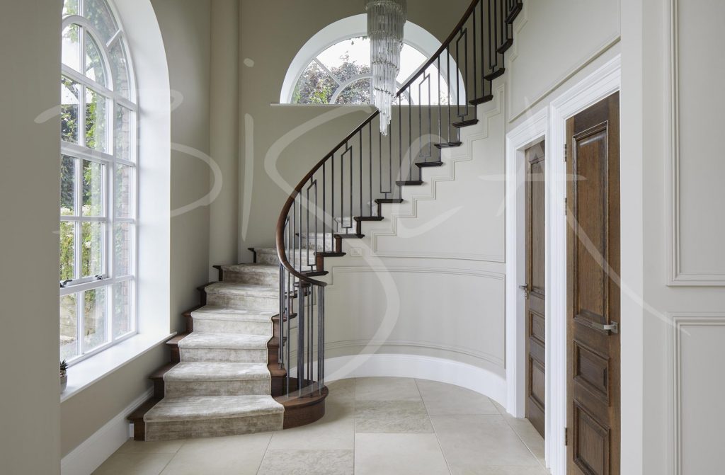 Curved Oak Staircase with Windows