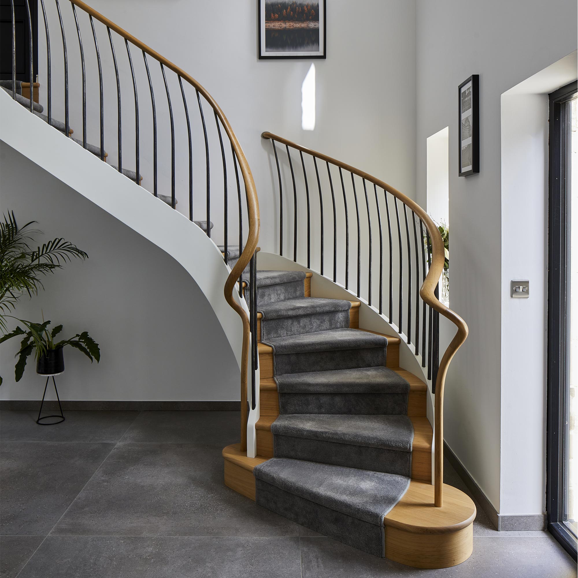 Curved Staircase with Metal Balustrade - Bisca Staircase Design