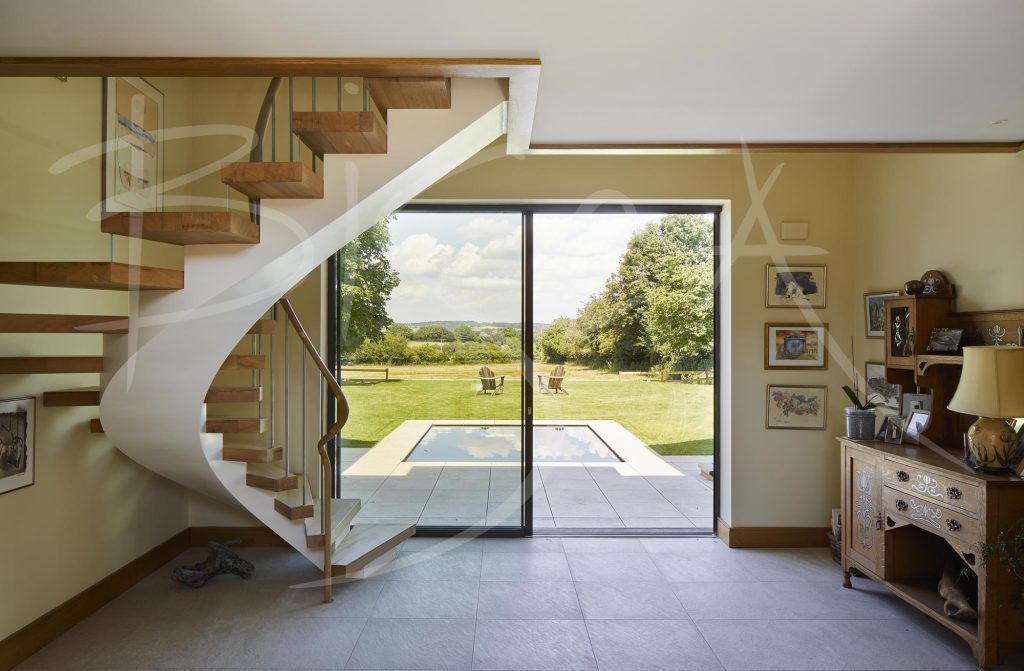 Elegant Curved Staircase with Oak Treads