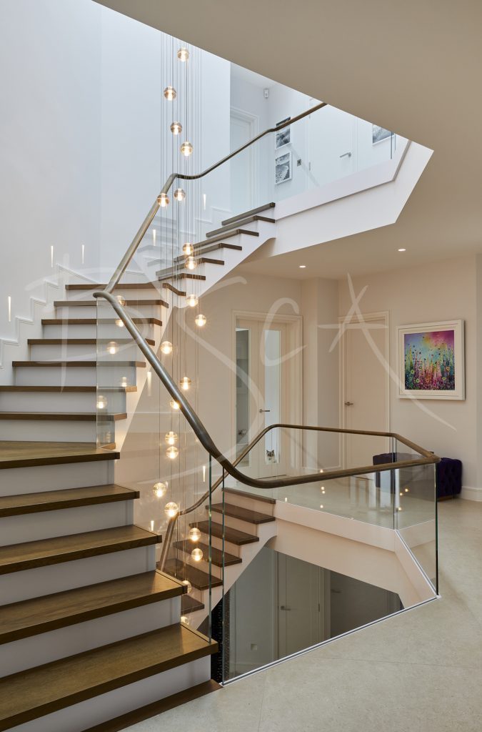 Elegant Glass Balustrade with Staircase Lighting