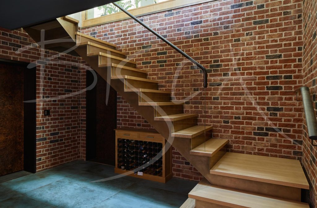 Four exclusive staircases with timber treads in the basement