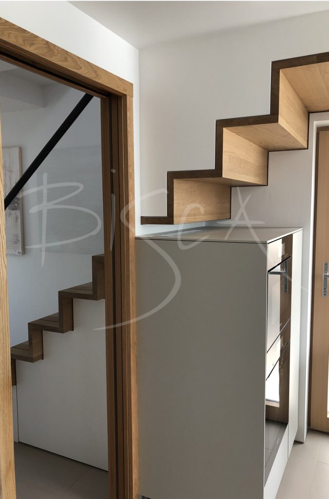 Modern kitchen staircase cut through wall