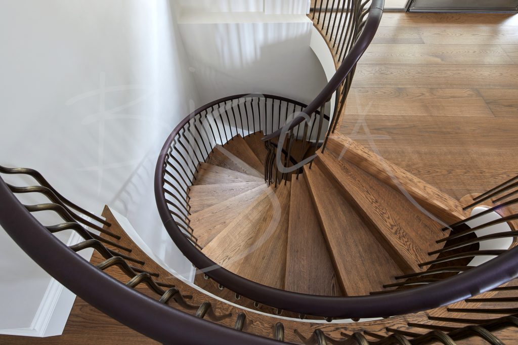 Elegant oak staircase featuring a beautiful central helix Elegant oak staircase featuring a beautiful central helix
