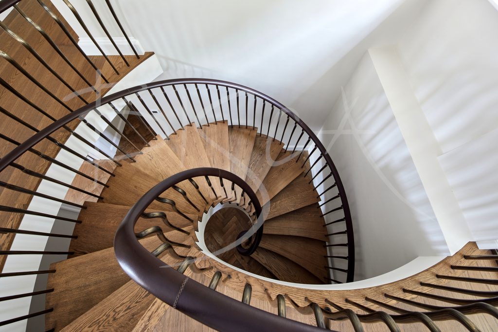 Sweeping curves create a sculptural focal point to this elegant oak staircase Sweeping curves create a sculptural focal point to this elegant oak staircase