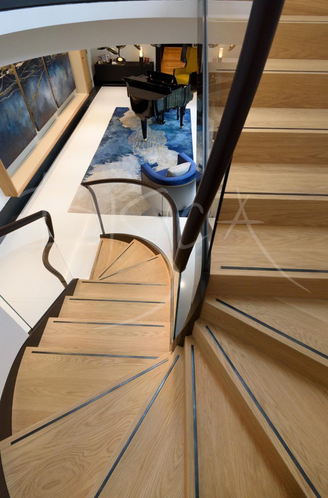 Elegant curved glass helical staircase